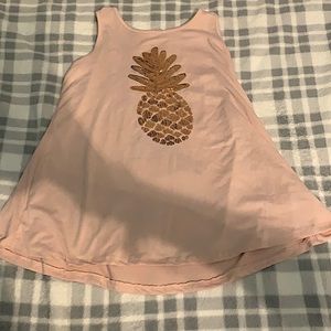 Soft, light pink, flowy btween top. Size 7